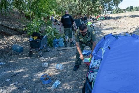 towed in tagalog|City of Sacramento to take Camp Resolution residents’ tents .